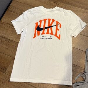 Nike White Tee with Orange and Black Logo